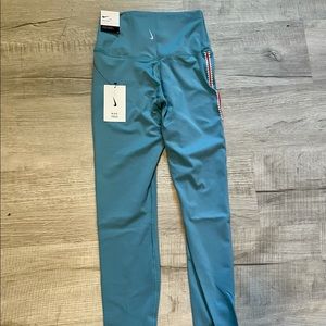 womans nike Dri-fit yoga crochet-edge 7/8 leggings. small. light blue. NWT